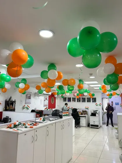 Another view of the Independence Day office decorations, showing the festive atmosphere.