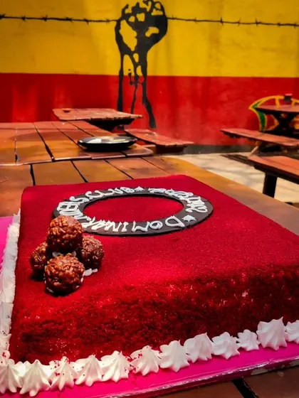 A close-up of our 5th-anniversary cake at Rasta Cafe. A special moment for our riding club.