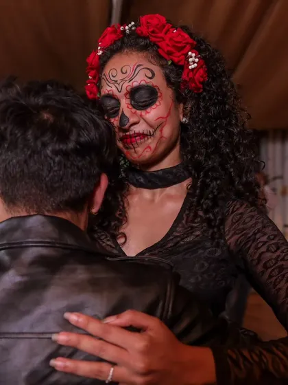 A close-up of the incredible sugar skull makeup on a dancer at our Halloween party. The artistry and effort from our community is always amazing.