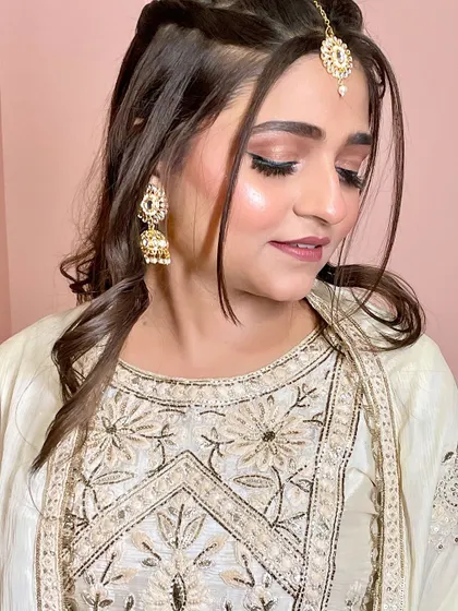 Another angle of this soft and pretty party makeup, showing the clean lines and flawless skin.