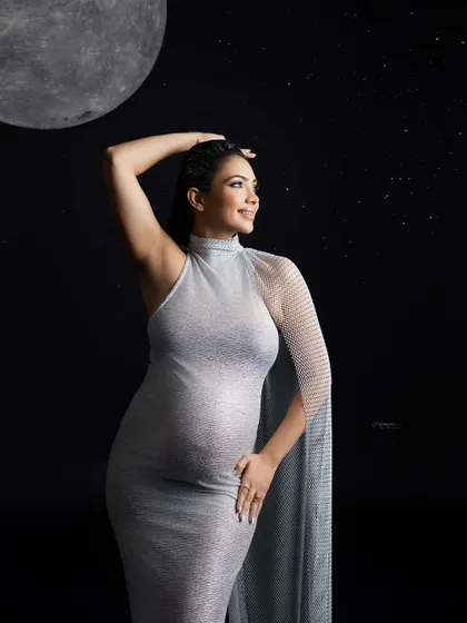 A closer look at our celestial maternity session. I angled the lights to make it look like moonlight was hugging her baby bump, creating a natural, otherworldly glow.