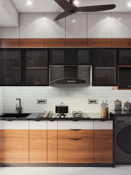 This kitchen design combines natural wood textures with modern black elements. The lower cabinets are finished in a warm wood laminate, while the upper cabinets have frosted black glass. I integrated the washing machine seamlessly into the layout next to the black granite sink.