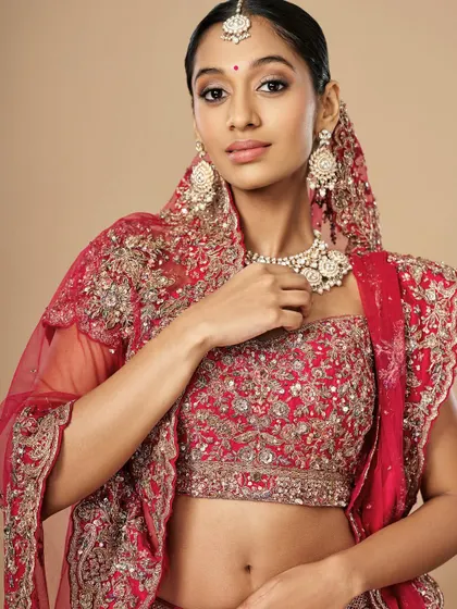 My talented student Diya showcasing her skills with this gorgeous red bridal look. The focus is on creating a radiant, confident bride.