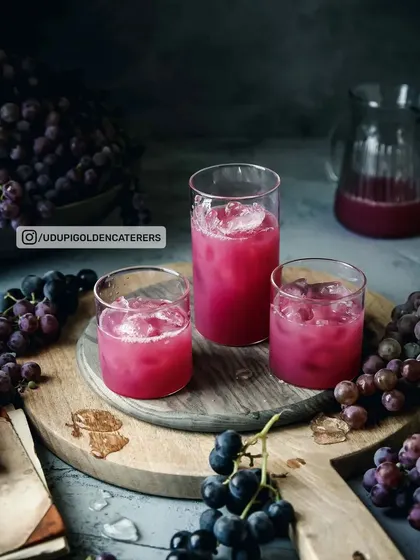 Freshly prepared Grape Juice served over ice. We use high-quality fruits to create natural and flavorful juices for our beverage menu.