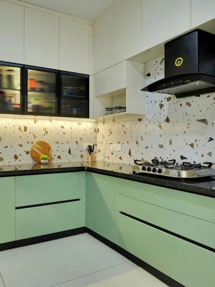 Duplicate of 184. A beautiful kitchen from the 'Shades of Sage' project, featuring mint green lower cabinets and a terrazzo-style backsplash.