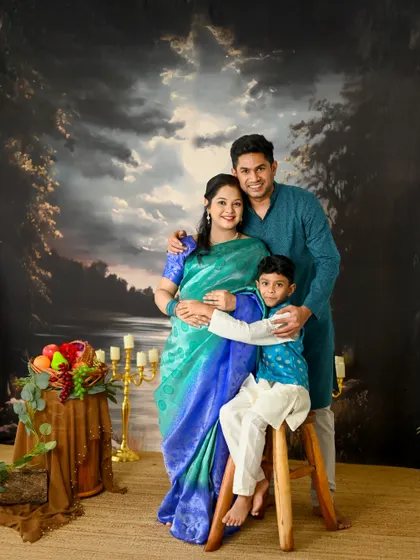 Maternity sessions are for the whole family. I love it when older siblings join in, and this traditional family portrait with a classic painted backdrop is a memory they will cherish forever.