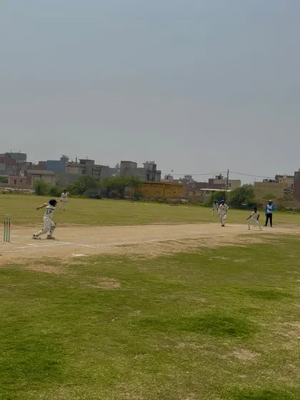 A young batsman running for a quick single during the final match.