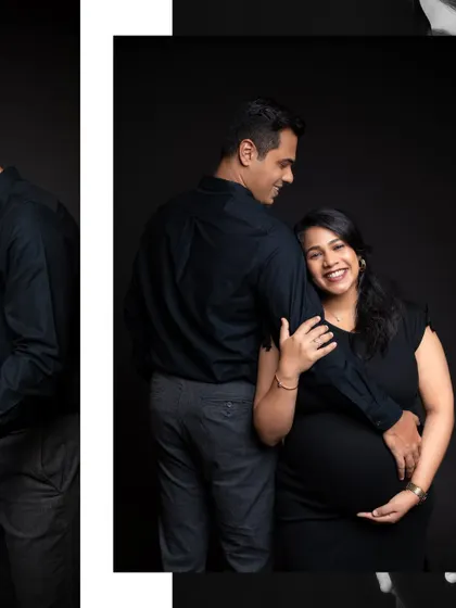 A classic couple's pose in black and white, showcasing the elegant lines of the simple black dress and the couple's connection.