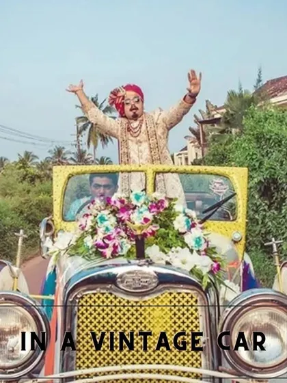 A classic and stylish groom entry in a decorated vintage car, perfect for adding a touch of old-world charm to the baraat.