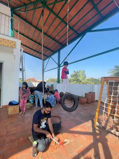 Our movement area is a place for play and building physical confidence. Here you can see our tire swing and other handmade structures that invite active exploration.