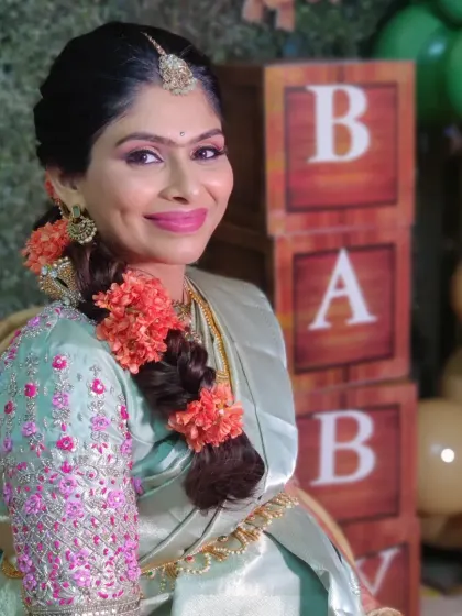 The beautiful Keerthana, glowing for her baby shower. We did a soft glam look with a pop of pink on the lips to match her saree.