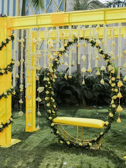 A beautiful floral swing, perfect for the bride to sit on during the Haldi ceremony and a great photo opportunity for guests.