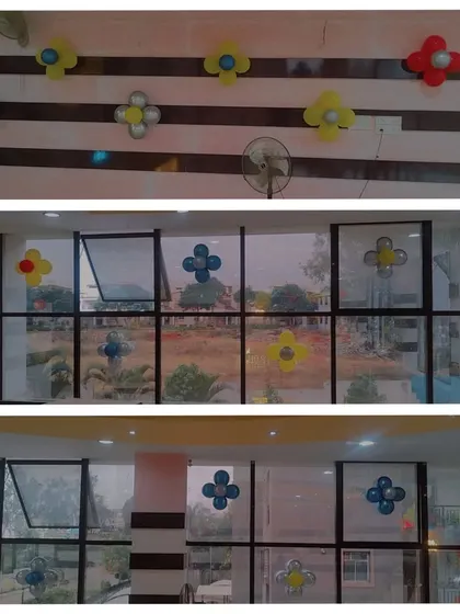 This collage shows simple but effective balloon flower decorations. I can place these on walls, windows, and pillars to spread a theme throughout an office space in a subtle way.