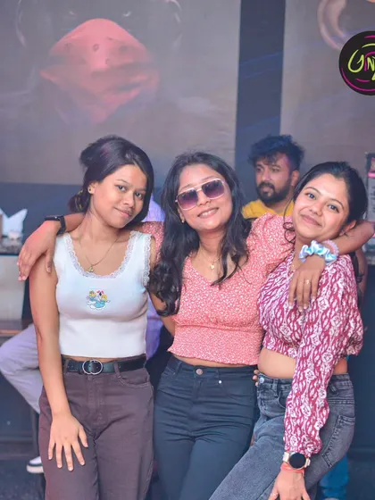 Friends having a great time and posing for a picture. My Saturday night gigs are all about good music and good company.