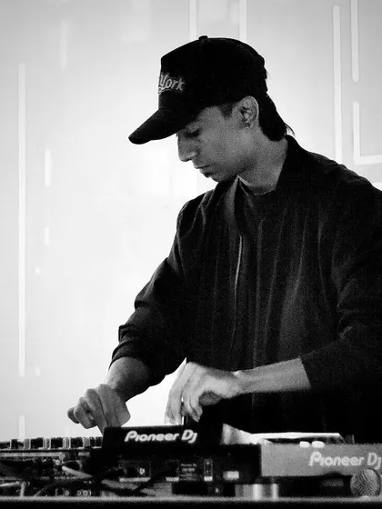 In the zone, finding the perfect beat. This is me at the console, completely focused on mixing tracks and creating a seamless flow of music. I use professional Pioneer DJ equipment to ensure the sound quality for your virtual event is top-notch.