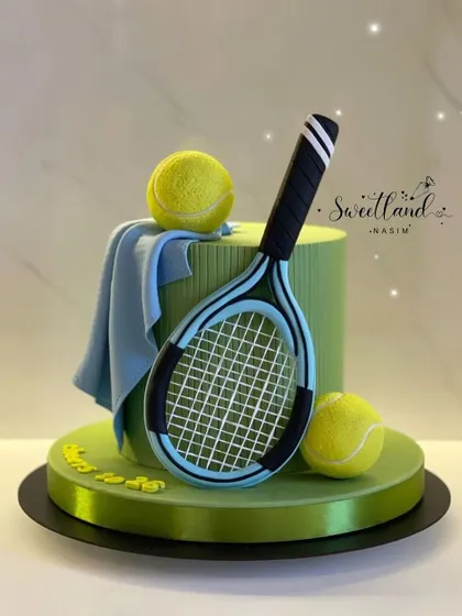 Another view of the impressive tennis-themed cake, perfect for any tennis lover.
