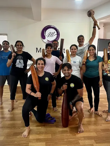 The energy in our workshops is always amazing. Here's our group posing with their clubs, feeling stronger after learning some new skills.