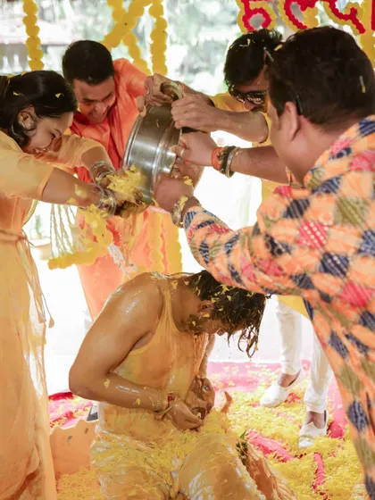 When friends and family join in the Haldi fun! We love capturing these moments of celebration where everyone gets involved.