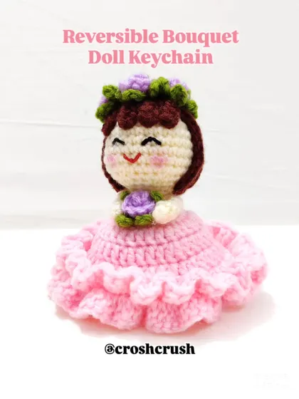 The front view of the adorable flower doll keychain.