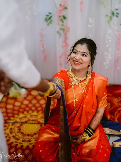 The bride's beautiful smile as she looks at her groom during the ceremony.