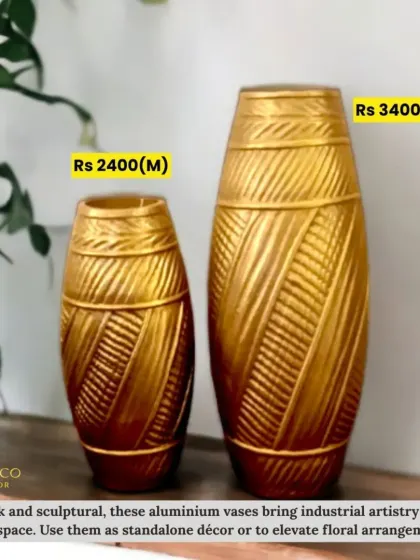 Sleek and sculptural, these aluminium vases bring industrial artistry into your space. I love using them as standalone decor or with tall floral arrangements. They are available in two sizes.