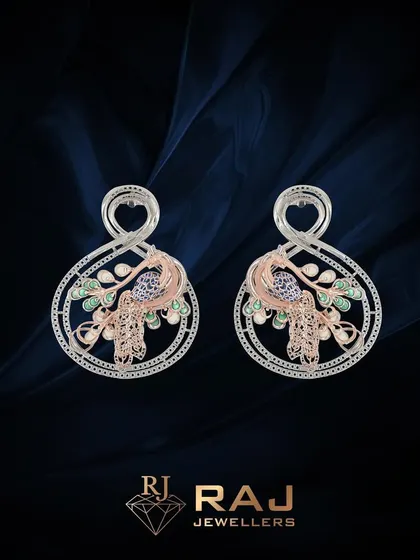 These matching Reti peacock earring mountings celebrate the profound impact of clean lines and subtle details. The two-tone gold filigree offers a quiet allure, ready to be personalized into a masterpiece of understated grace.