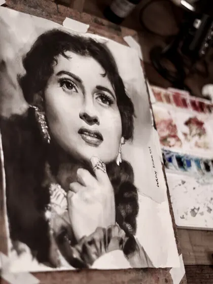 The Madhubala portrait on my easel, capturing a moody, atmospheric shot of the work in the studio.