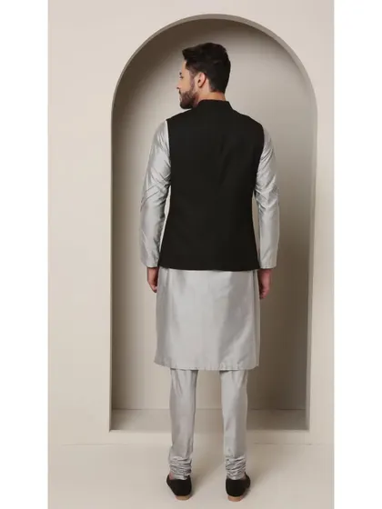 The back view of the 'Shoorveer' set. Even from the back, the tailored fit and the clean silhouette are paramount, ensuring you look impeccable from every angle.