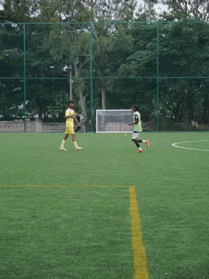 Players spread out during a possession-based drill. We look for intelligent movement and awareness of space.