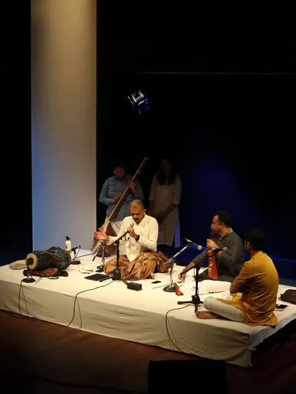 The musicians prepare for T.M. Krishna's concert.
