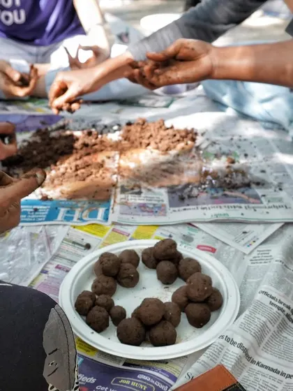 Introducing our seed ball making workshop. Here, students and faculty from Ramaiah University joined hands to make over 100 seed balls as part of a day of therapeutic gardening activities.