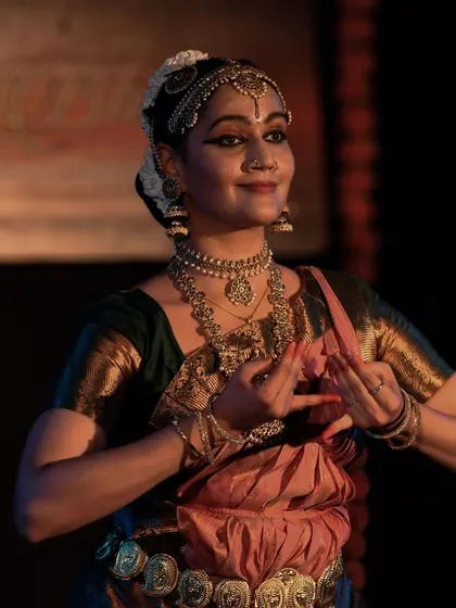 A moment of serene expression, capturing the 'bhava' or emotion of the dance.