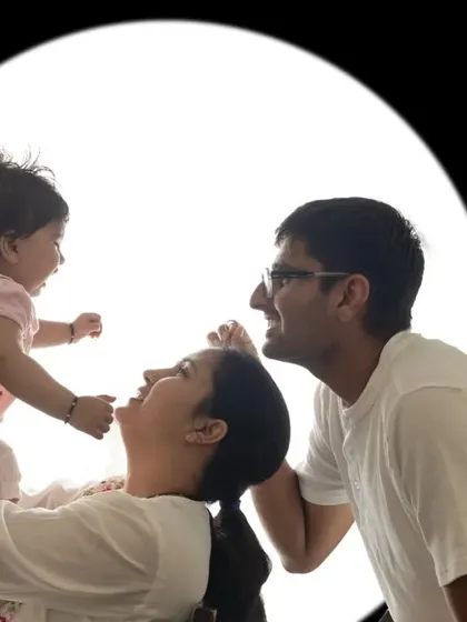 These backlit silhouette portraits create a dramatic and emotional image, focusing on the shape and connection between family members without distraction.