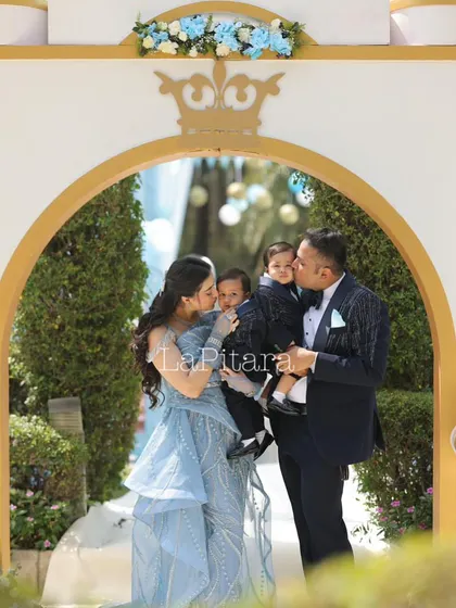 A heartwarming moment captured as the family enters through the royal archway. These personal touches and photo opportunities are a key part of the event experience I design.