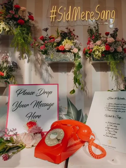 The audio guestbook station from the Mehendi, where guests could leave a heartfelt or funny message for the couple using a vintage-style telephone. A fun and personal touch.