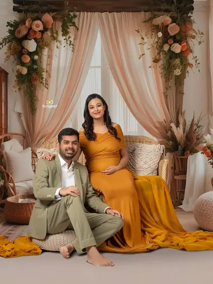 A relaxed and happy couple's portrait in our warm, earthy boho setup. Their coordinated outfits complete the beautiful, natural look.
