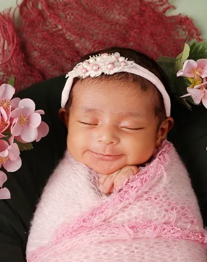Picture perfect. This smiling close-up is one of those magical, once-in-a-lifetime shots that every parent dreams of.