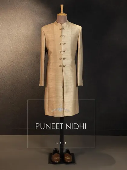An antique color Matka Silk double-button Achkan. A simple yet powerful statement of heritage and style.
