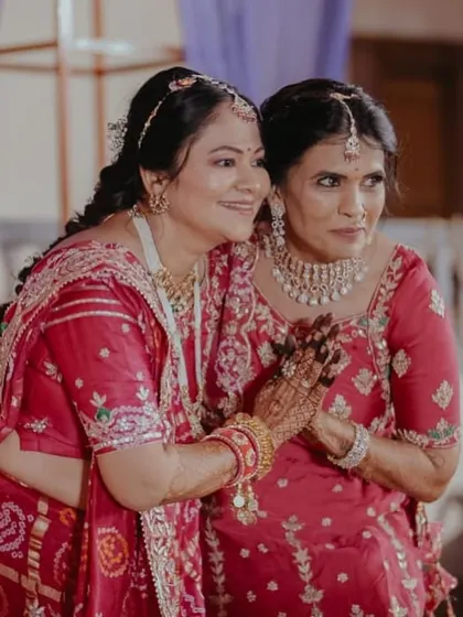 A sweet moment between the groom's mother and another family member. I love creating looks that bring out the joy and confidence in everyone.