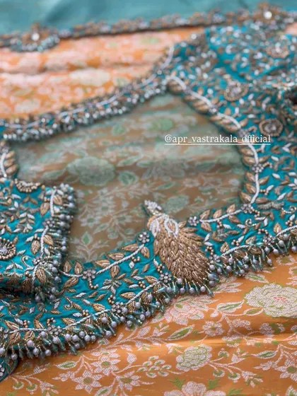 The back of the turquoise blouse, showing the intricate details.
