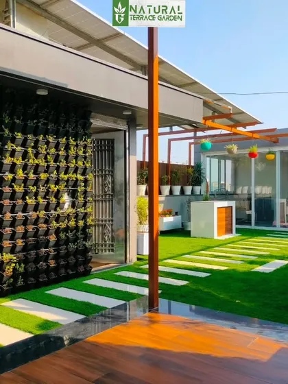 A view of the large vertical garden installed at our Sonipat project, creating a massive green wall that acts as a stunning backdrop.