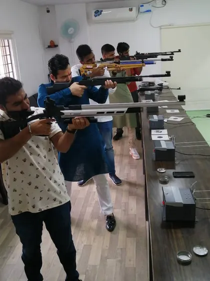 Shooters using different types of professional air rifles during a session. You get to experience what it feels like to handle high-quality sporting equipment.
