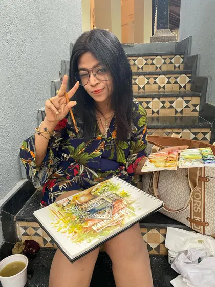 Doing a quick sketch in a gorgeous property. This is me, finding a quiet corner to capture the beauty of the place in my sketchbook.