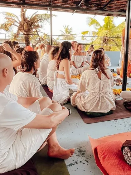 Students sit in a circle during the opening ceremony in Kerala, listening intently. This image captures the sense of focus and shared purpose that marks the beginning of our courses.