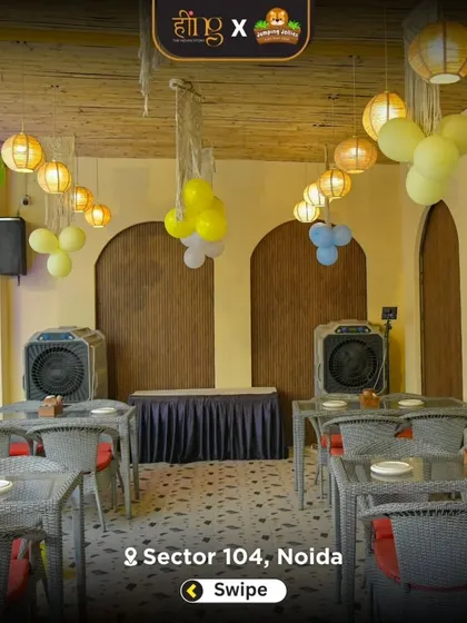 The outdoor covered dining area set up for a party. The space is versatile and can be arranged to accommodate buffet lines and guest seating for events of all sizes.