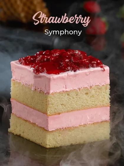 Another view of the beautiful pink layers of our Strawberry Symphony ice cream cake.