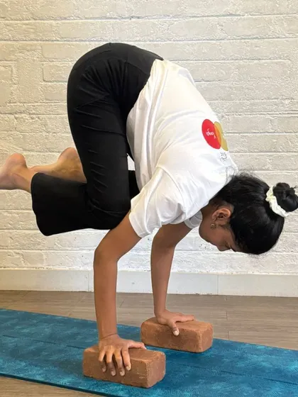 Mastery in Bakasana is a testament to the discipline and hard work of our TTC students. This pose is a cornerstone for learning more complex arm balances and inversions.