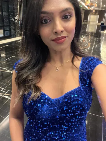 Another selfie showing my makeup and sequined dress for the Harman townhall.