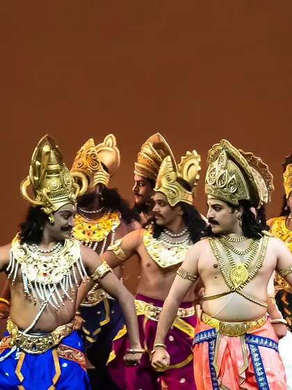 The male ensemble of our dance company in full costume and character. Choreographing for an all-male group allows for powerful, synchronized movements that bring a unique energy and martial grace to our mythological productions.