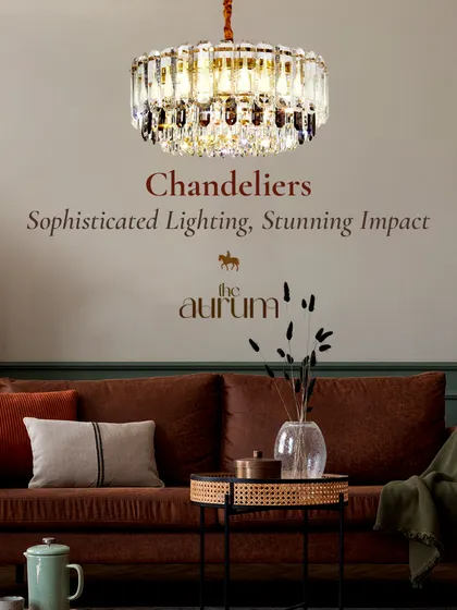 This crystal-encrusted drum chandelier adds a touch of glamour to a cozy living room. It’s a sophisticated piece that provides both ambient light and a stunning visual impact.